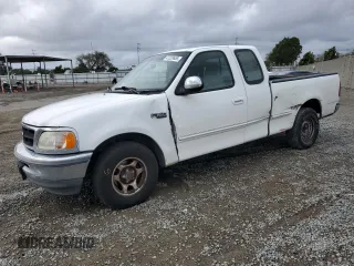 1997 Ford F-150 with VIN 1FTDX1720VKC47038, listed as a Copart auction lot 47228655 with 201,139 mi miles and Salvage title. Bid and sale history available at DreamBid. Image 1.