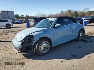 2013 Volkswagen Beetle 2.5L with VIN 3VW5X7AT3DM822049, listed as a Copart auction lot 86797814 with 103,201 mi miles and Salvage title. Bid and sale history available at DreamBid. Image 1.