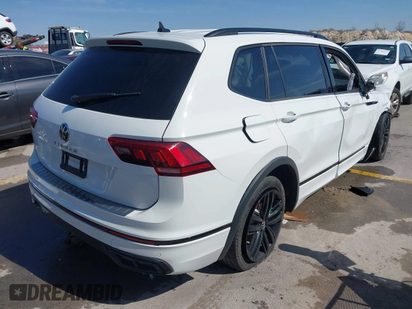 2022 Volkswagen Tiguan SE R-Line Black with VIN 3VVCB7AX9NM009779, listed as a IAAI auction lot 41696952 with Not provided miles and . Bid and sale history available at DreamBid. Image 4.