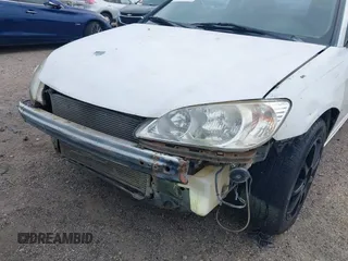 2005 Honda Civic Cpe LX with VIN 1HGEM22595L051891, listed as a IAAI auction lot 41271309 with 146,060 mi miles. Bid and sale history available at carsss.com. Image 6.