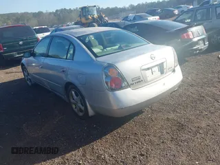 2004 Nissan Altima S with VIN 1N4AL11D34C140198, listed as a IAAI auction lot 41821256 with 182,905 mi miles. Bid and sale history available at carsss.com. Image 3.