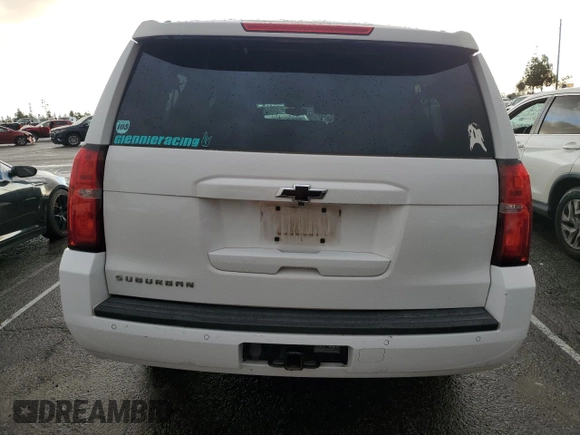 2015 Chevrolet Suburban LS with VIN 1GNSCHKC9FR667540, listed as a Copart auction lot 80908574 with 125,428 mi miles and Salvage title. Bid and sale history available at DreamBid. Image 6.
