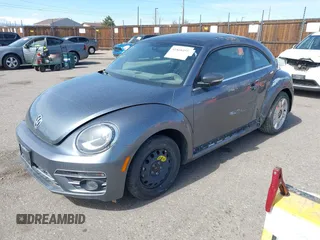 2018 Volkswagen Beetle SE with VIN 3VWJD7AT2JM710412, listed as a IAAI auction lot 41868455 with 1 mi miles. Bid and sale history available at carsss.com. Image 18.