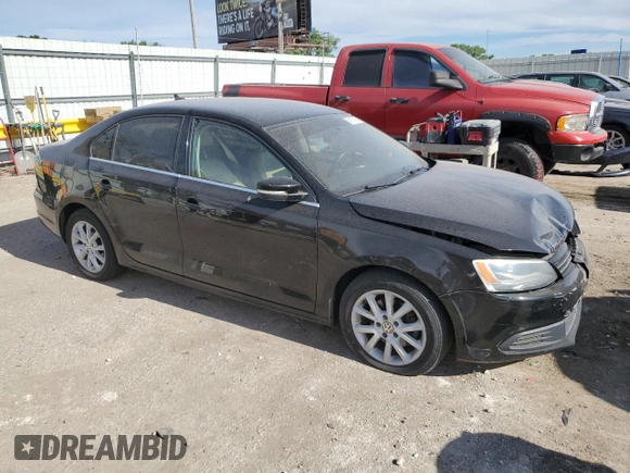 2013 Volkswagen Jetta SE with VIN 3VWDX7AJ5DM443466, listed as a Copart auction lot 56181425 with 131,557 mi miles and Salvage title. Bid and sale history available at DreamBid. Image 4.