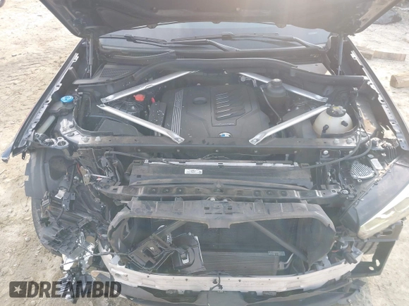 2020 BMW X5 sDrive40i with VIN 5UXCR4C06LLW64438, listed as a IAAI auction lot 41520407 with 89,868 mi miles and . Bid and sale history available at DreamBid. Image 10.