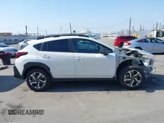 2024 Subaru Crosstrek Premium z VIN JF2GUADC2R8336410, wystawiony jako IAAI lot #42385768 z przebiegiem 22 126 mil mil oraz . Historia ofert i sprzedaży dostępna na DreamBid. Obrazek 14.