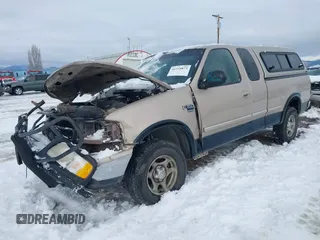 1998 Ford F-150 z VIN 1FTZX18W5WKB97701, wystawiony jako IAAI lot #41254873 z przebiegiem 291 523 mil mil oraz . Historia ofert i sprzedaży dostępna na DreamBid. Obrazek 2.