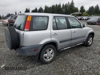 1999 Honda CR-V EX with VIN JHLRD1866XC074271, listed as a Copart auction lot 68741914 with 296,297 mi miles and Salvage Title. Bid and sale history available at carsss.com. Image 3.