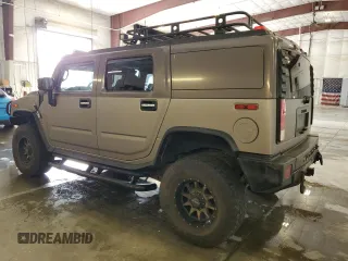 2006 Hummer H2 z VIN 5GRGN23U96H115103, wystawiony jako Copart lot #59346915 z przebiegiem 184 241 mil mil oraz Tytuł czysty. Historia ofert i sprzedaży dostępna na DreamBid. Obrazek 2.