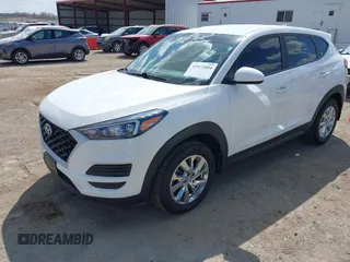 2019 Hyundai Tucson SE with VIN KM8J2CA43KU870933, listed as a IAAI auction lot 41972884 with 53,029 mi miles. Bid and sale history available at carsss.com. Image 2.