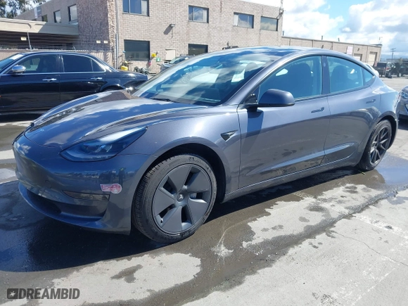 2023 Tesla Model 3 with VIN 5YJ3E1EA0PF698076, listed as a IAAI auction lot 41744362 with 12,838 mi miles. Bid and sale history available at carsss.com. Image 2.