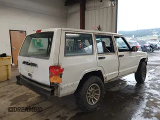 1997 Jeep Cherokee SE with VIN 1J4FJ28S1VL528218, listed as a IAAI auction lot 41931137 with 210,196 mi miles. Bid and sale history available at carsss.com. Image 4.