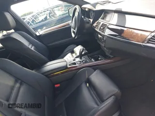 2012 BMW X5 35d with VIN 5UXZW0C56CL664575, listed as a IAAI auction lot 42559674 with 157,554 mi miles and . Bid and sale history available at DreamBid. Image 5.