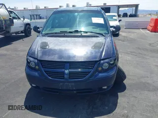 2005 Dodge Caravan SXT with VIN 1D8GP45R65B280660, listed as a IAAI auction lot 42169027 with 246,407 mi miles and . Bid and sale history available at carsss.com. Image 6.
