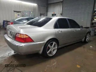2002 Acura RL z VIN JH4KA96502C012064, wystawiony jako Copart lot #88080895 z przebiegiem 107 477 mil mil oraz Szkoda całkowita • Salvage title. Historia ofert i sprzedaży dostępna na DreamBid. Obrazek 3.