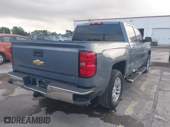 2015 Chevrolet Silverado 1500 LT with VIN 3GCUKREC8FG535021, listed as a IAAI auction lot 42154626 with 125,897 mi miles and . Bid and sale history available at DreamBid. Image 4.