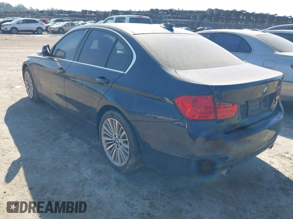 2014 BMW 3 Series 335i with VIN WBA3A9C54EF477943, listed as a IAAI auction lot 41632554 with 102,273 mi miles. Bid and sale history available at carsss.com. Image 3.
