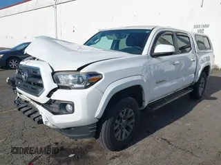 2017 Toyota Tacoma SR5 with VIN 3TMAZ5CN3HM045330, listed as a IAAI auction lot 41371012 with 20,170 mi miles and . Bid and sale history available at DreamBid. Image 2.