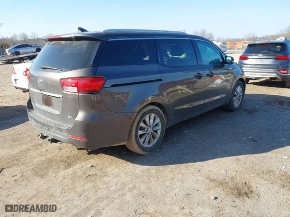 2016 Kia Sedona EX with VIN KNDMC5C14G6108235, listed as a IAAI auction lot 41497169 with 105,218 mi miles. Bid and sale history available at carsss.com. Image 4.