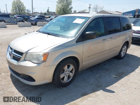 2013 Dodge Grand Caravan SE with VIN 2C4RDGBG9DR642162, listed as a IAAI auction lot 42113378 with 182,370 mi miles and . Bid and sale history available at DreamBid. Image 2.