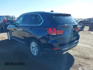 2016 BMW X5 sDrive35i with VIN 5UXKR2C55G0R71330, listed as a IAAI auction lot 41661140 with 128,457 mi miles. Bid and sale history available at carsss.com. Image 3.