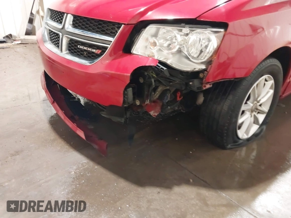 2013 Dodge Grand Caravan SXT with VIN 2C4RDGCG9DR669053, listed as a IAAI auction lot 41626033 with 170,007 mi miles and . Bid and sale history available at DreamBid. Image 6.