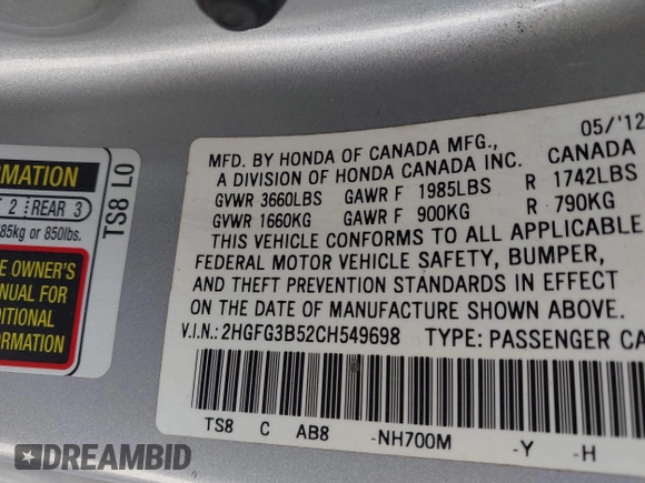 2012 Honda Civic Cpe LX with VIN 2HGFG3B52CH549698, listed as a IAAI auction lot 41818647 with 100,975 mi miles. Bid and sale history available at carsss.com. Image 9.