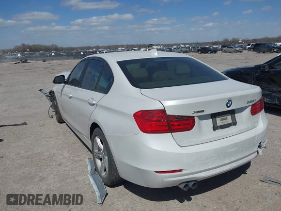 2014 BMW 3 Series 328i xDrive with VIN WBA3B3G51ENR81859, listed as a IAAI auction lot 41828729 with 129,498 mi miles. Bid and sale history available at carsss.com. Image 3.