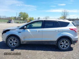 2016 Ford Escape Titanium with VIN 1FMCU9JX6GUB80715, listed as a IAAI auction lot 42060305 with 132,951 mi miles and . Bid and sale history available at DreamBid. Image 14.