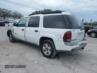 2003 Chevrolet TrailBlazer EXT LT with VIN 1GNES16S736235213, listed as a IAAI auction lot 41237480 with 297,434 mi miles and . Bid and sale history available at DreamBid. Image 3.