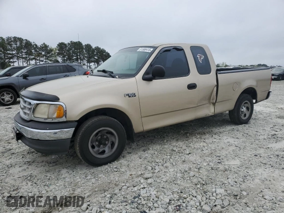 1999 Ford F-150 with VIN 1FTZX1721XNA37541, listed as a Copart auction lot 51588415 with 267,071 mi miles and Salvage title. Bid and sale history available at DreamBid. Image 1.