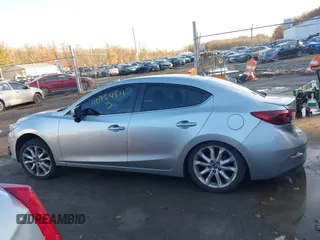 2014 Mazda 3 S Grand Touring with VIN JM1BM1W38E1184450, listed as a IAAI auction lot 40954511 with 157,036 mi miles and . Bid and sale history available at DreamBid. Image 13.