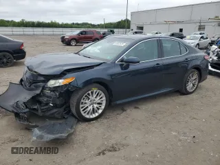 2018 Toyota Camry LE с VIN 4T1B11HK8JU524486, выставлен на аукционе Copart как лот 59952345 с пробегом 110 736 миль миль и Списание • Salvage title. История ставок и продаж доступна на DreamBid. Изображение 1.