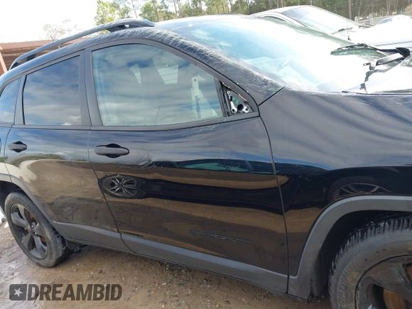 2017 Jeep Cherokee Altitude with VIN 1C4PJLAB7HW660624, listed as a IAAI auction lot 41488683 with 106,963 mi miles and . Bid and sale history available at DreamBid. Image 13.