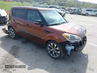 2012 Kia Soul + with VIN KNDJT2A63C7422074, listed as a IAAI auction lot 41911029 with 112,125 mi miles. Bid and sale history available at carsss.com. Image 1.