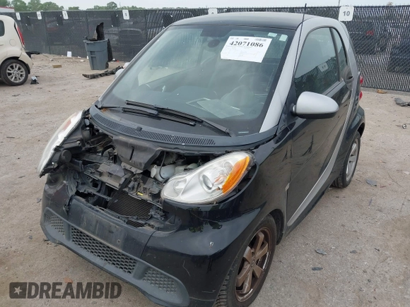 2013 Smart fortwo Pure with VIN WMEEJ3BA5DK620493, listed as a IAAI auction lot 42071086 with 85,883 mi miles and . Bid and sale history available at DreamBid. Image 18.