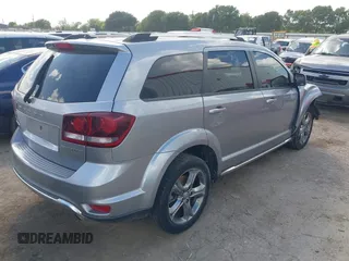 2017 Dodge Journey Crossroad Plus z VIN 3C4PDCGB7HT617499, wystawiony jako IAAI lot #42531173 z przebiegiem 176 182 mil mil oraz . Historia ofert i sprzedaży dostępna na DreamBid. Obrazek 4.