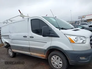 2020 Ford Transit Cargo z VIN 1FTBR1Y86LKA30515, wystawiony jako IAAI lot #41441522 z przebiegiem 84 331 mil mil oraz . Historia ofert i sprzedaży dostępna na DreamBid. Obrazek 13.