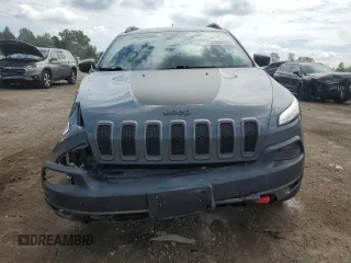 2015 Jeep Cherokee Trailhawk with VIN 1C4PJMBB1FW630715, listed as a Copart auction lot 58559675 with 58,302 mi miles and Salvage title. Bid and sale history available at DreamBid. Image 5.