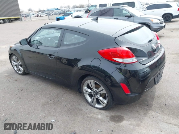 2013 Hyundai Veloster w/Black Int with VIN KMHTC6AD8DU155575, listed as a IAAI auction lot 41722849 with 100,204 mi miles and . Bid and sale history available at DreamBid. Image 3.