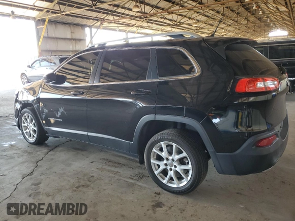2018 Jeep Cherokee Latitude with VIN 1C4PJLCX6JD531185, listed as a Copart auction lot 61922815 with 246,133 mi miles and Salvage title. Bid and sale history available at DreamBid. Image 2.