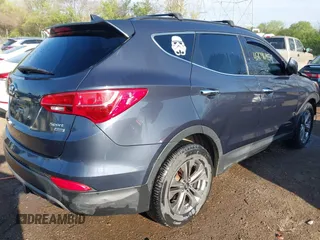 2016 Hyundai Santa Fe z VIN 5XYZUDLB3GG312687, wystawiony jako IAAI lot #42096854 z przebiegiem 162 586 mil mil oraz . Historia ofert i sprzedaży dostępna na DreamBid. Obrazek 4.