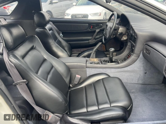 1992 Mitsubishi 3000GT z VIN JA3XE74CXNY058167, wystawiony jako Copart lot #84192254 z przebiegiem 69 411 mil mil oraz Czysty tytuł • Clean title. Historia ofert i sprzedaży dostępna na DreamBid. Obrazek 5.