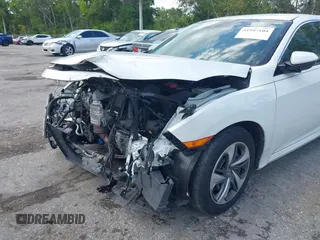 2020 Honda Civic LX z VIN 2HGFC2F65LH531818, wystawiony jako IAAI lot #41997104 z przebiegiem 68 878 mil mil oraz . Historia ofert i sprzedaży dostępna na DreamBid. Obrazek 6.