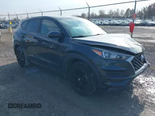 2019 Hyundai Tucson SE with VIN KM8J23A4XKU932814, listed as a IAAI auction lot 40968319 with 107,365 mi miles. Bid and sale history available at carsss.com. Image 1.