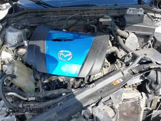 2012 Mazda Mazda3 i Touring with VIN JM1BL1L89C1558242, listed as a IAAI auction lot 42057513 with 112,094 mi miles. Bid and sale history available at carsss.com. Image 10.