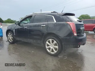 2014 Cadillac SRX Premium Collection with VIN 3GYFNGE3XES526525, listed as a Copart auction lot 57426425 with 211,476 mi miles and Clean title. Bid and sale history available at DreamBid. Image 2.