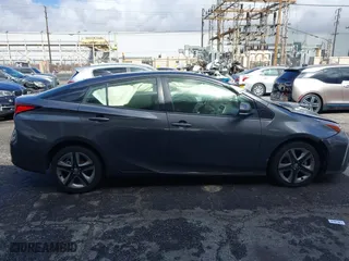 2022 Toyota Prius L Eco with VIN JTDKAMFU7N3155268, listed as a IAAI auction lot 41589024 with 158,430 mi miles. Bid and sale history available at carsss.com. Image 13.