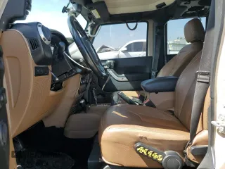 2016 Jeep Wrangler Unlimited Rubicon z VIN 1C4HJWFGXGL236560, wystawiony jako Copart lot #57528355 z przebiegiem 64 634 mil mil oraz Szkoda całkowita • Salvage title. Historia ofert i sprzedaży dostępna na DreamBid. Obrazek 7.