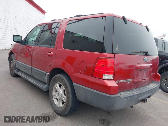 2004 Ford Expedition XLT with VIN 1FMPU16W54LB57799, listed as a IAAI auction lot 41538969 with 289,424 mi miles. Bid and sale history available at carsss.com. Image 3.
